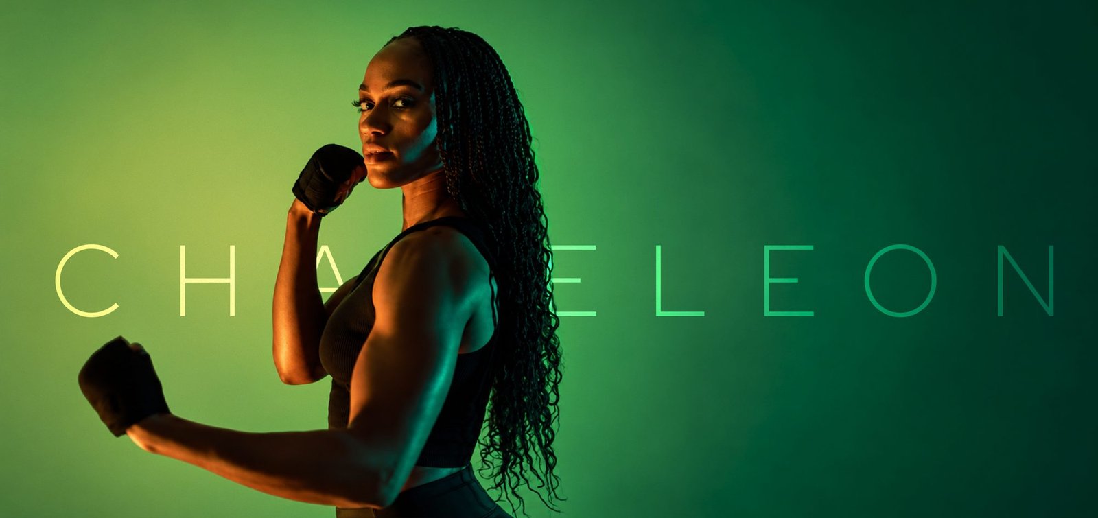 Athlete portrait lit in green for the Chameleon Performance brand.